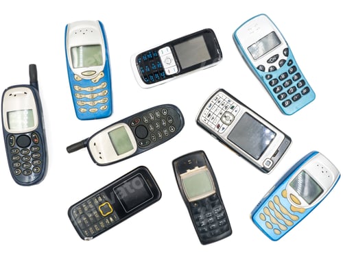 Preview: Top view of Old mobile phones on white background