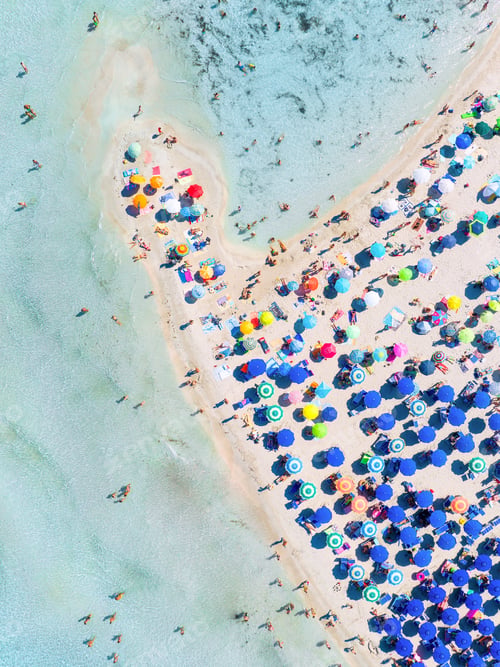 Preview: Top view from drone at beach and azure sea. Aerial view on beach, people and umbrellas.
