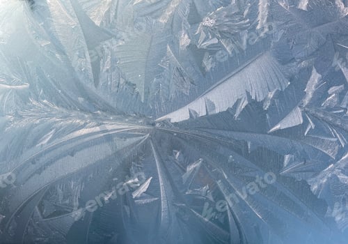 Preview: frosty patterns on the car roof, abstract background, ice pattern on the surface, silver color