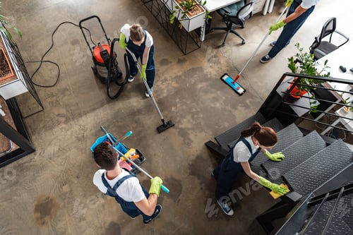 Preview: top view of cleaning company team cleaning modern office