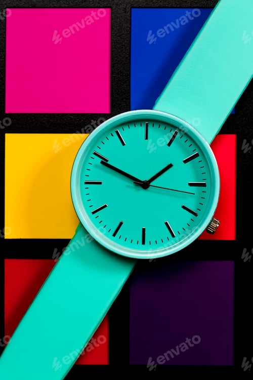 Preview: Colorful Squares with a Teal Watch on Display
