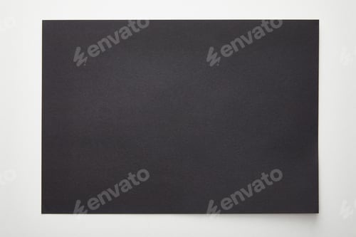 Preview: top view of empty black paper on white background