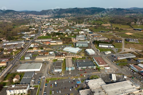 Preview: Aerial view of goods warehouses and logistics center in industrial city zone from above
