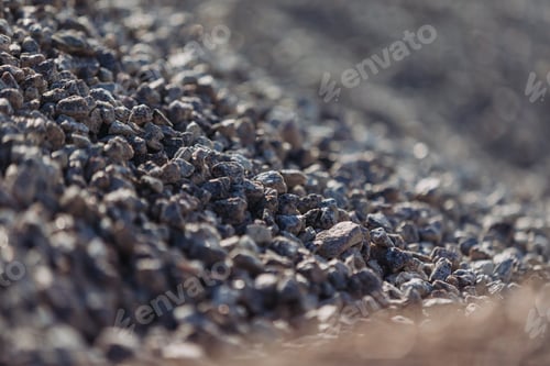 Preview: Gravel pile forming a small slope in concrete production plant