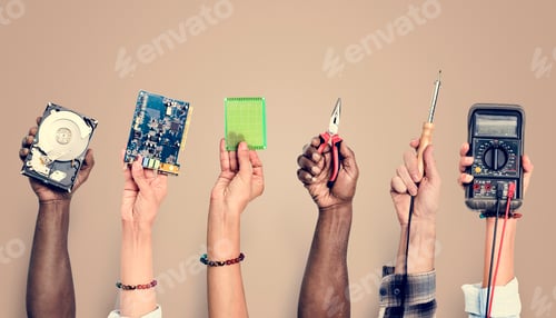 Preview: Diverse hands holding electronics tools on brown background