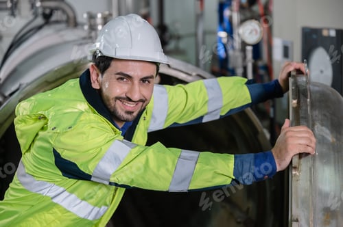 Preview: technician engineer working to maintenance a construction equipment industry