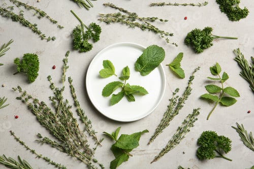 Preview: Flat lay composition with aromatic herbs on table