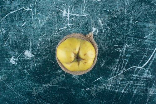 Preview: Fresh yellow quince on marble background