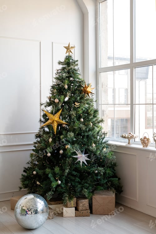 Preview: Christmas tree with presents and lights in light and airy living room