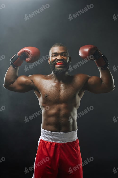 Preview: African American boxer raising hands prepared to fight