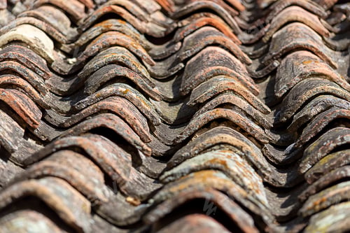Preview: Roof tiles an old Bulgarian house. View from the front, an abandoned village in Crimea.