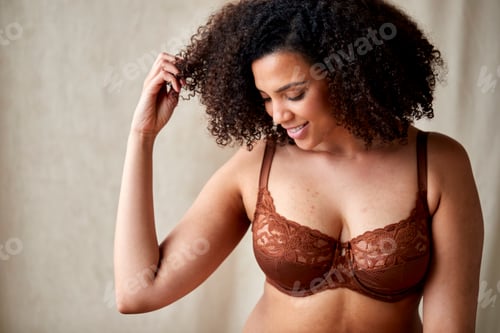 Preview: Studio Shot Of Confident Natural Woman In Underwear Promoting Body Positivity