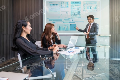 Preview: Group Of Asian Business people with formal suit working and talking together