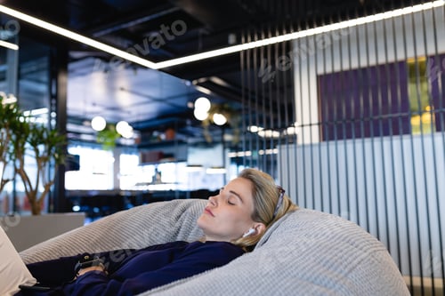 Preview: Caucasian woman chilling in a bean bag
