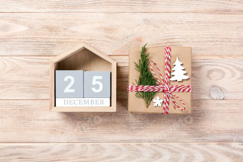 Preview: Calendar with date 25 december and gift boxes on color background.