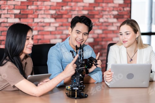 Preview: Young students researching inventions with modern technology