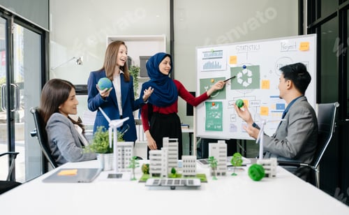 Preview: Business people having consultation about wind energy at company office. Business team discussing