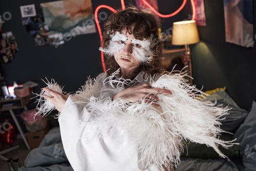 Preview: Portrait of Creative Caucasian Teen Girl Posing Dramatically in Bedroom