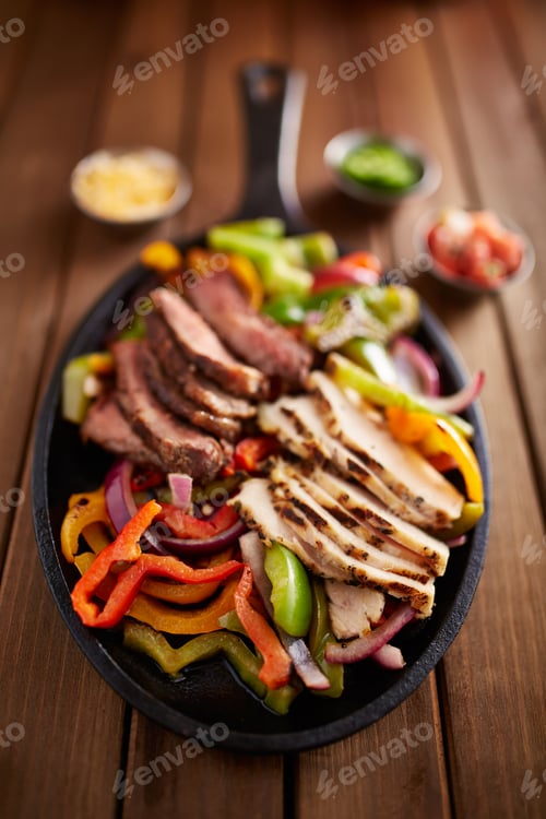 Preview: mexican steak and chicken fajitas in cast iron skillet