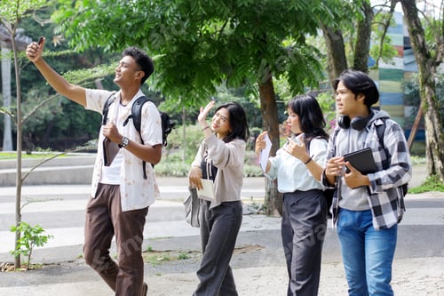 Preview: Students Taking Selfie Outside Campus Building