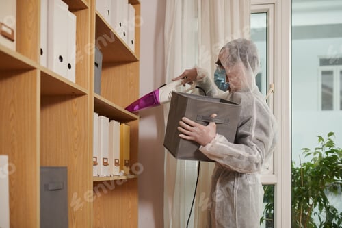 Preview: Worker Vacuum Cleaning Shelves