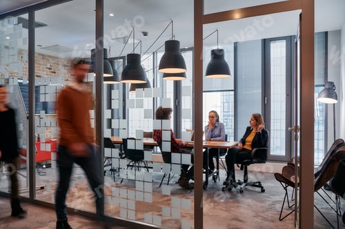 Preview: In the dynamic hustle and bustle of a business environment, a group of young business professionals