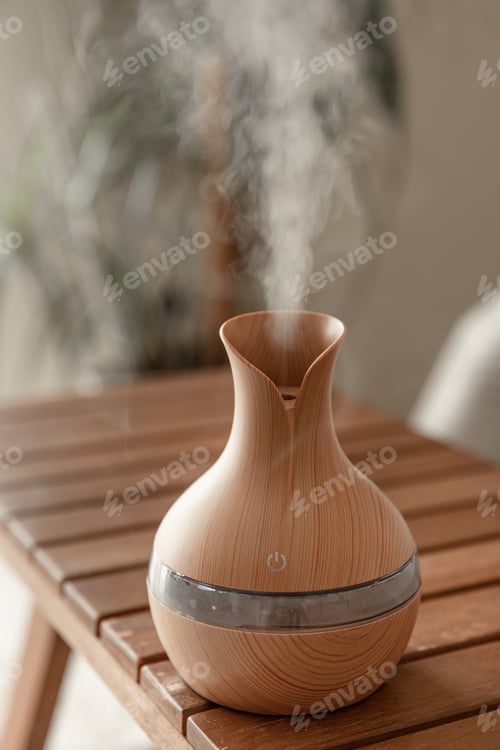 Preview: Aroma oil diffuser lamp on a blurred background.