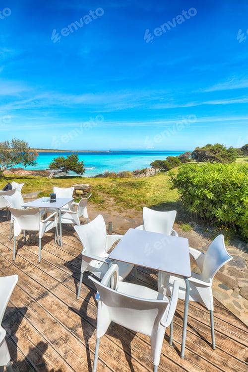 Preview: Beach restaurant on Famous La Pelosa beach on sunny summer day.