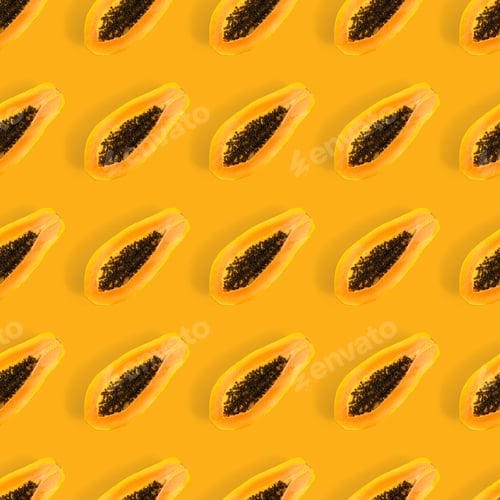 Preview: Fresh ripe papaya seamless pattern on orange background. Tropical abstract background. Top view.