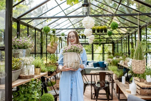 Preview: Woman with lavender in the greenhouse