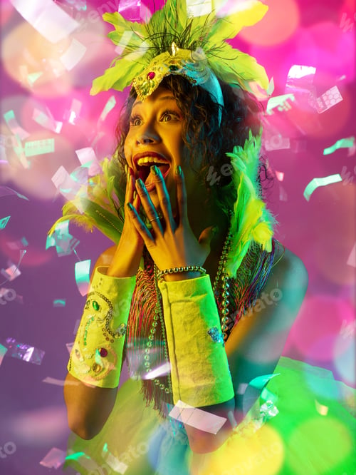 Preview: Beautiful young woman in carnival and masquerade costume in colorful neon lights on gradient