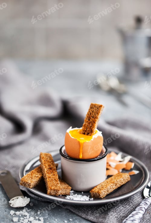 Preview: Soft boiled egg with rye toasts for breakfast