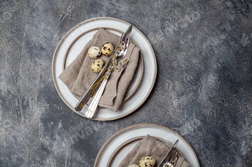Preview: Easter festive table setting with quail eggs. top view