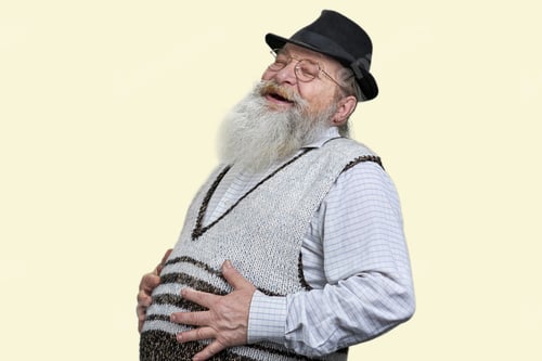 Preview: Smiling Senior Man in Knit Vest and Hat