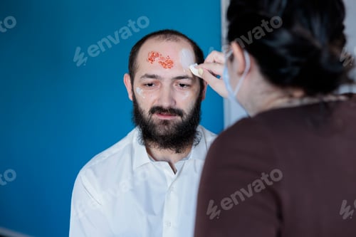 Preview: Girlfriend helping man prepare for halloween party, dressing him as zombie
