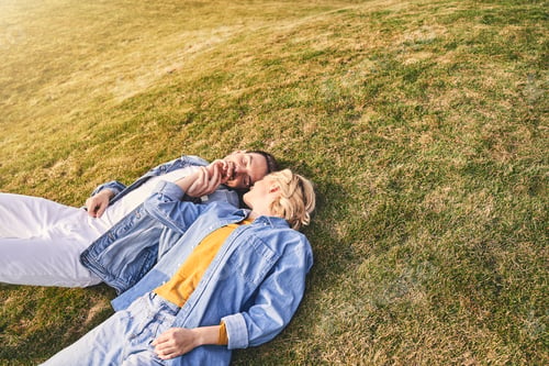 Preview: Loving young man kissing his girlfriends hand
