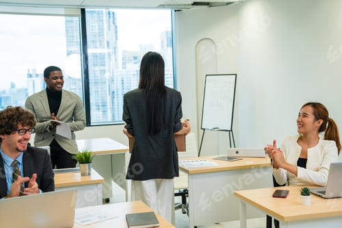 Preview: Beautiful young female carrying office box and hired for a new job.