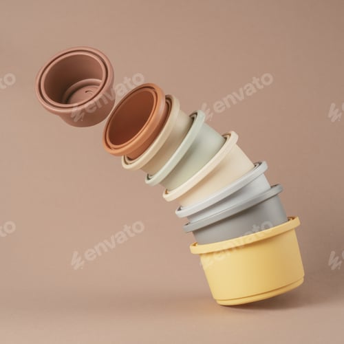 Preview: Set of colorful silicone bowls of different size for water game and play with sand stacked in column