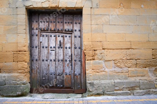 Preview: Millennial wooden door and stone facade
