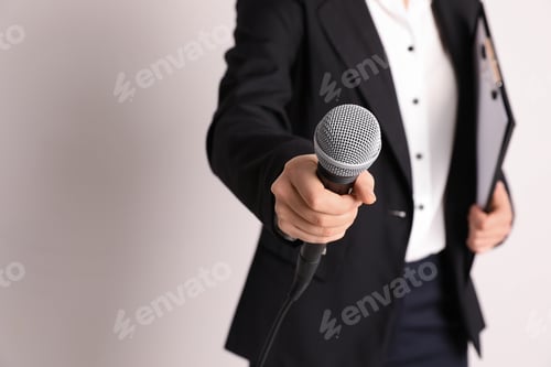 Preview: Young businesswoman holding microphone and clipboard on color background. Space for text