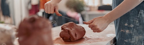 Preview: Diligent master molding clay product in ceramics workshop