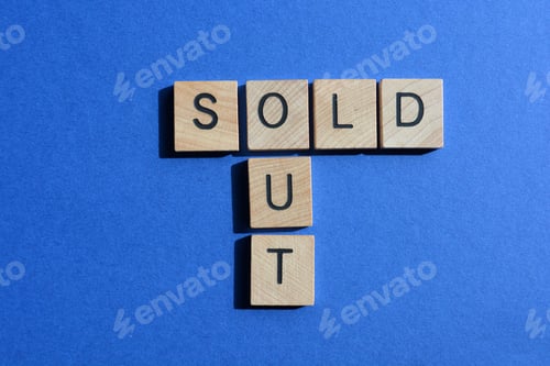 Preview: Sold Out, words in 3D wooden alphabet letters isolated on blue background