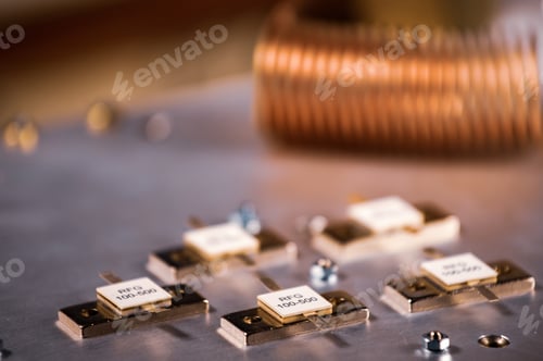 Preview: Close-up of five metal plates on a large iron case