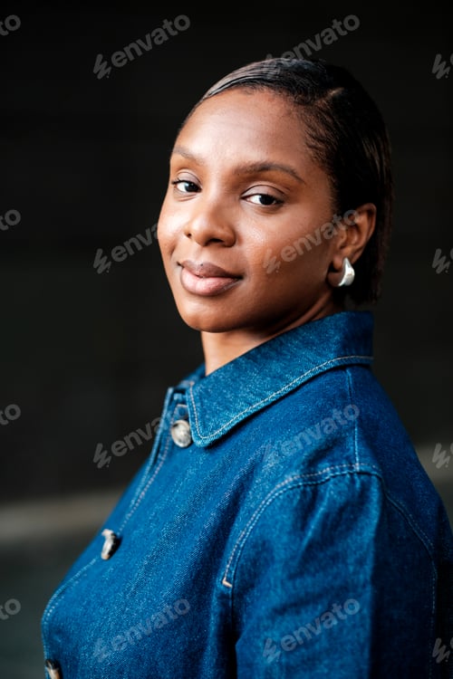 Preview: Woman Wearing Denim Jacket Looking at Camera