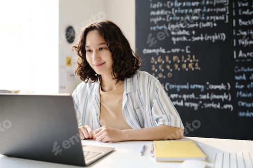 Preview: Student studying online using laptop