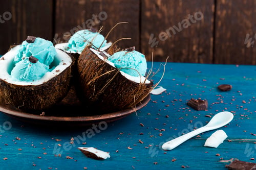 Preview: Blue ice cream in coconut bowl.