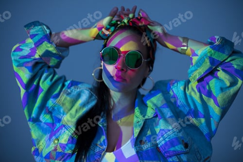 Preview: Woman with face colored with light