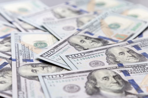Preview: side view of the scattered hundred dollar bills
