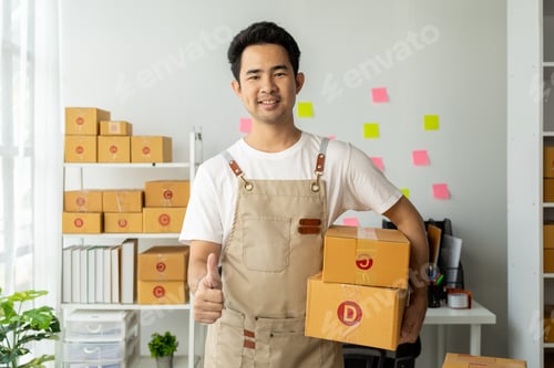 Preview: Male online shop owner, online shop owner distributes products on website, packs products according