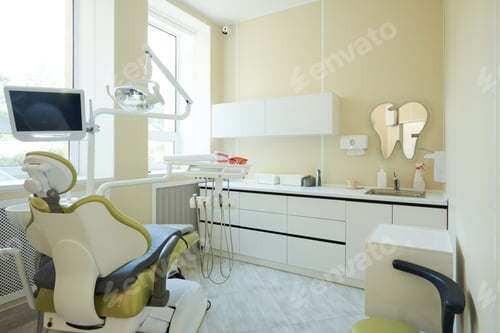 Preview: Modern Dental Office Interior Featuring Dental Chair and Equipment